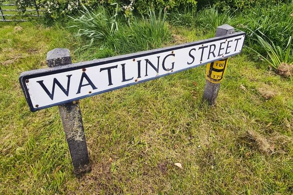 Watling Street road sign on grass verge